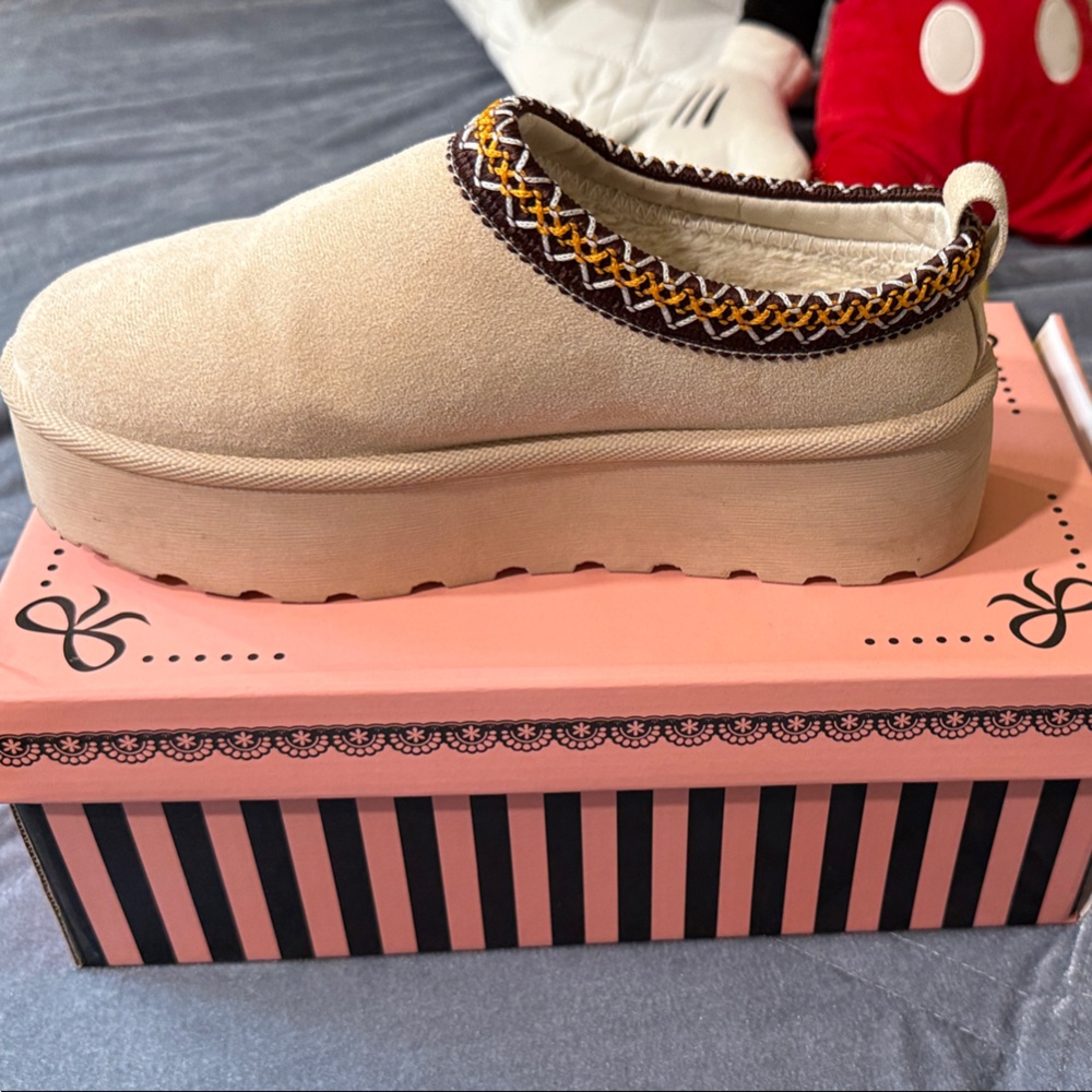 Beige Slip-On Shoes with Brown Trim
